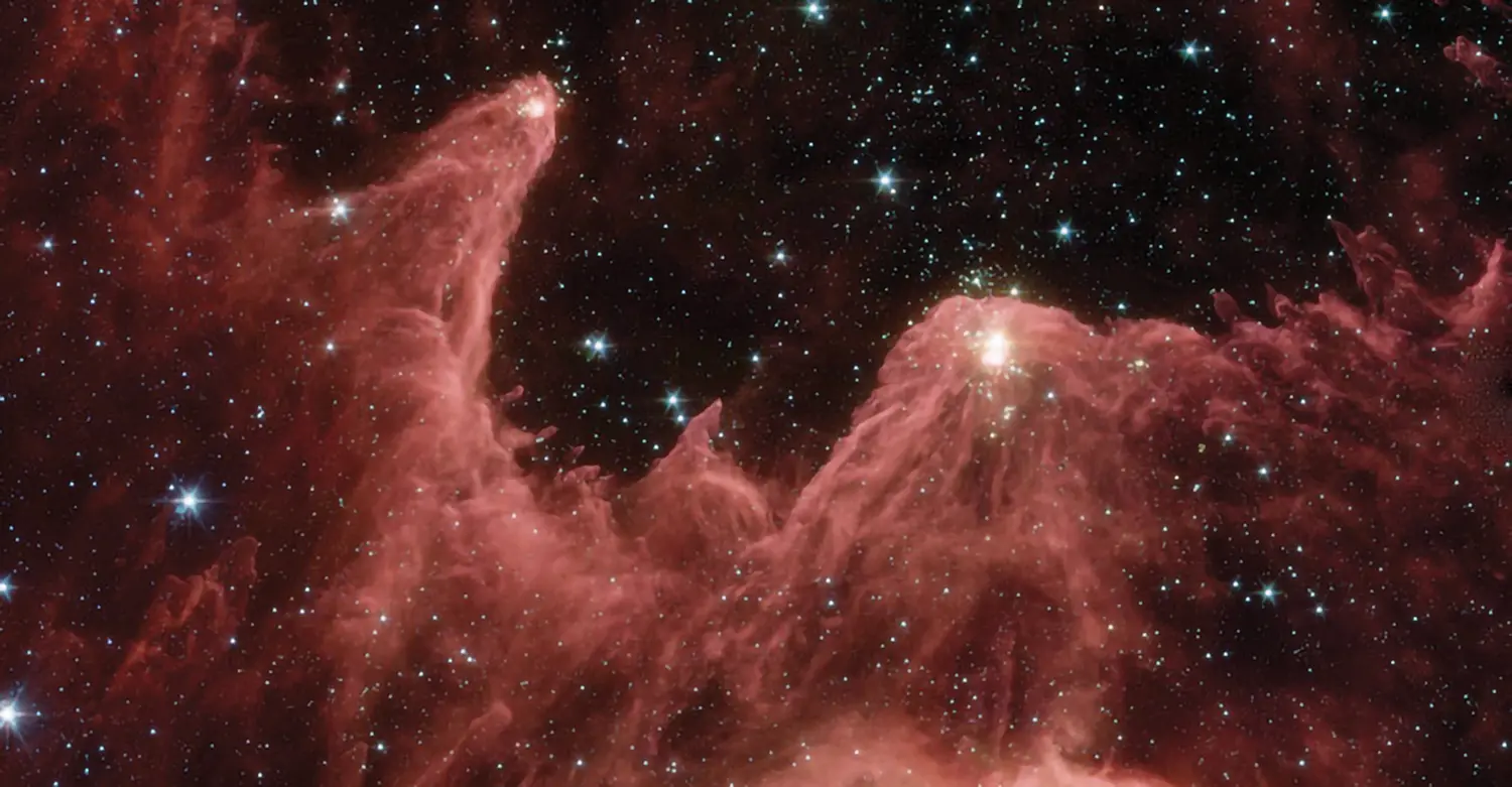 Image d’une nébuleuse observée dans l’espace, illustrant les spectacles immersifs et les projections astronomiques du Planétarium de Bretagne