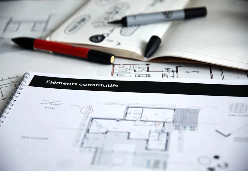 Zoom sur une page technique de la charte graphique Trecobat présentant un plan d’architecte annoté